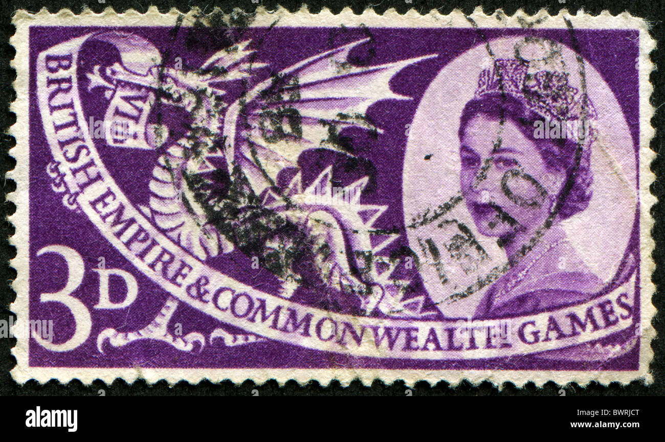 CIRCA 1958 : timbre imprimé en Grande-Bretagne montrant un dragon gallois célébration de l'Empire britannique et du Commonwealth, vers 1958 Banque D'Images