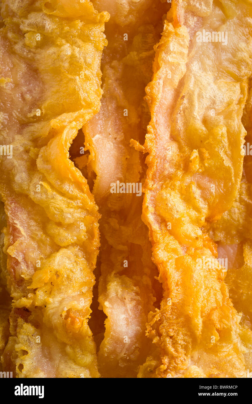 Chicken-Fried - tranches de bacon Bacon trempée dans un mélange de poudre  de lait entier et de l'eau, jetée dans la farine et frits Photo Stock -  Alamy