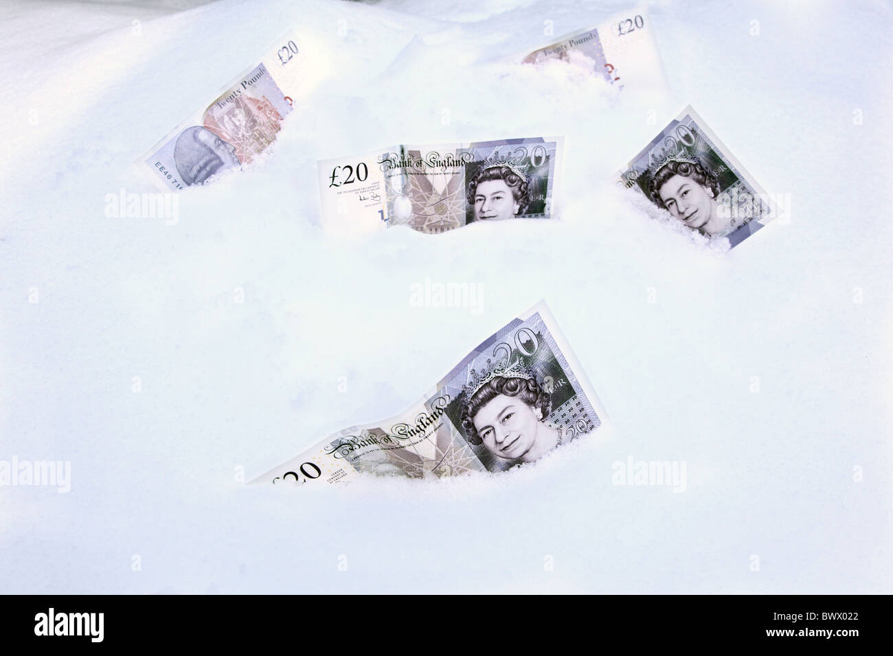 €100s d'une valeur de €20 notes se trouvant sur la neige Banque D'Images