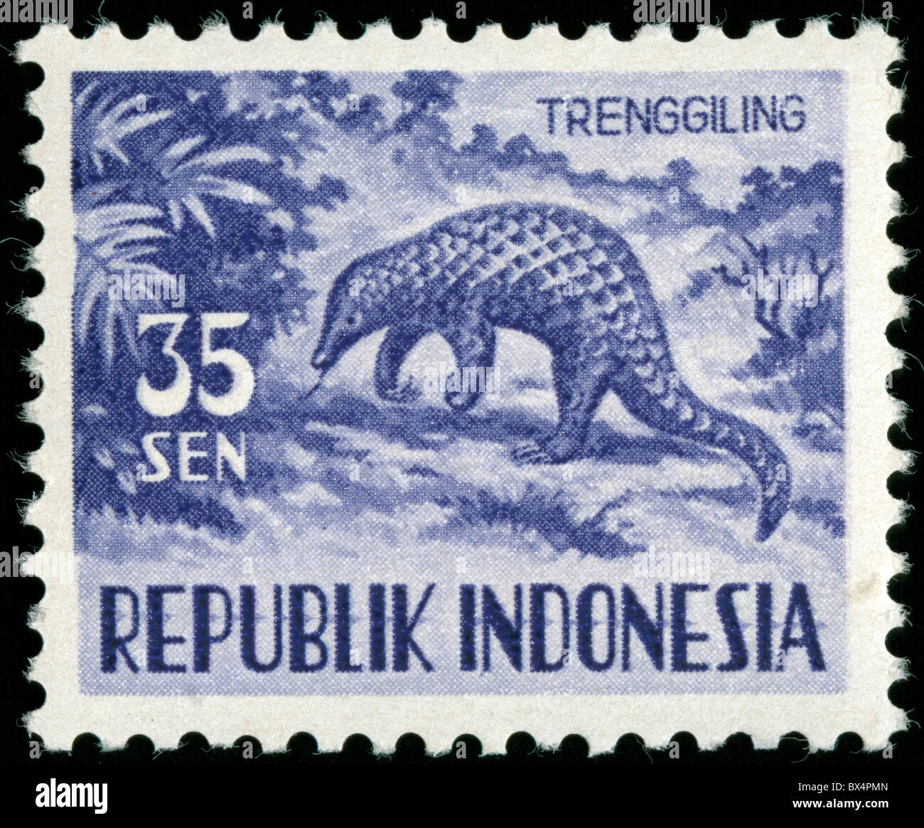 Timbres anciens d'Indonésie avec lizard Banque D'Images