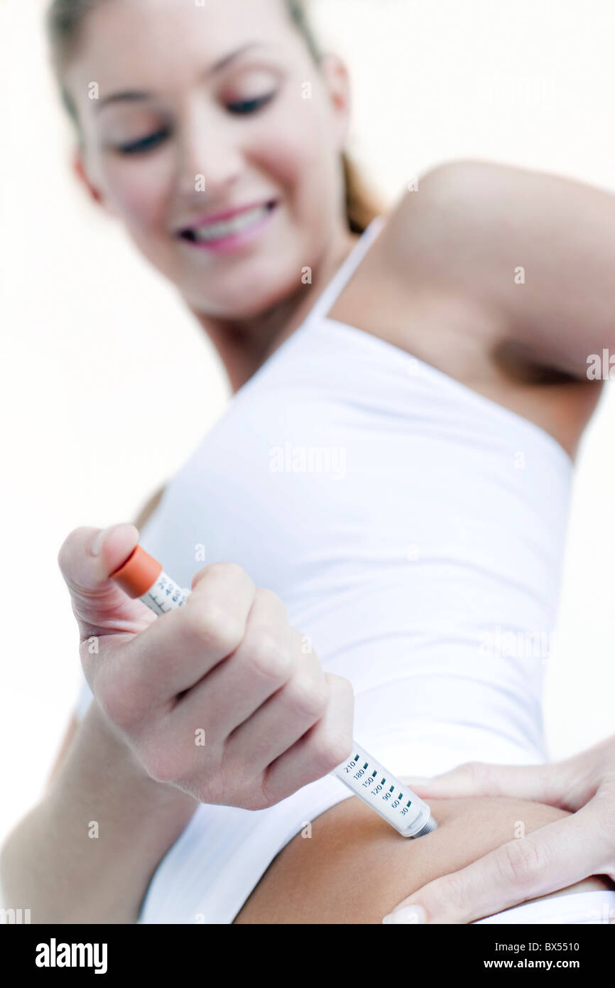 L'injection d'insuline Banque D'Images