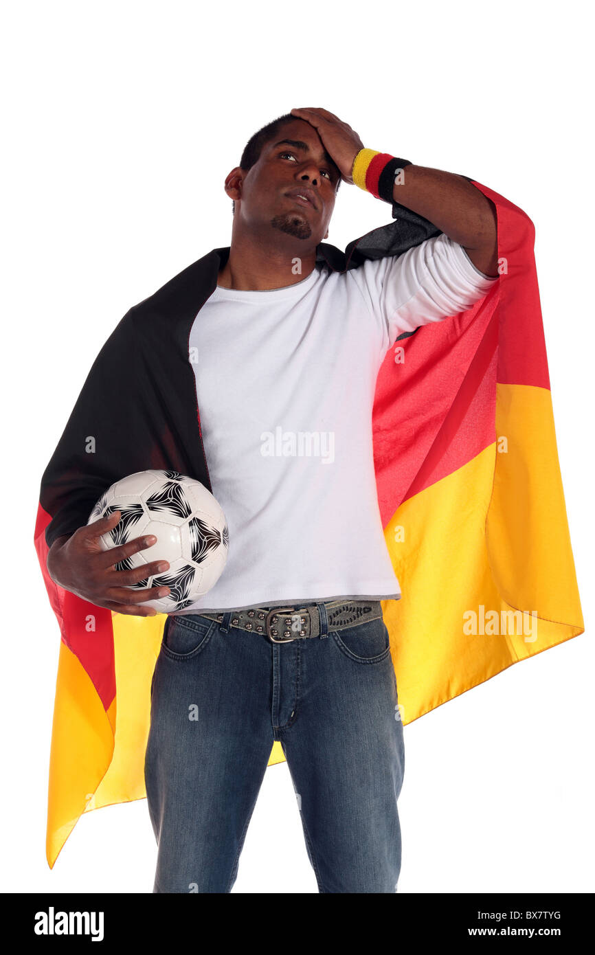 Un supporter de football allemand frustré. Le tout sur fond blanc. Banque D'Images