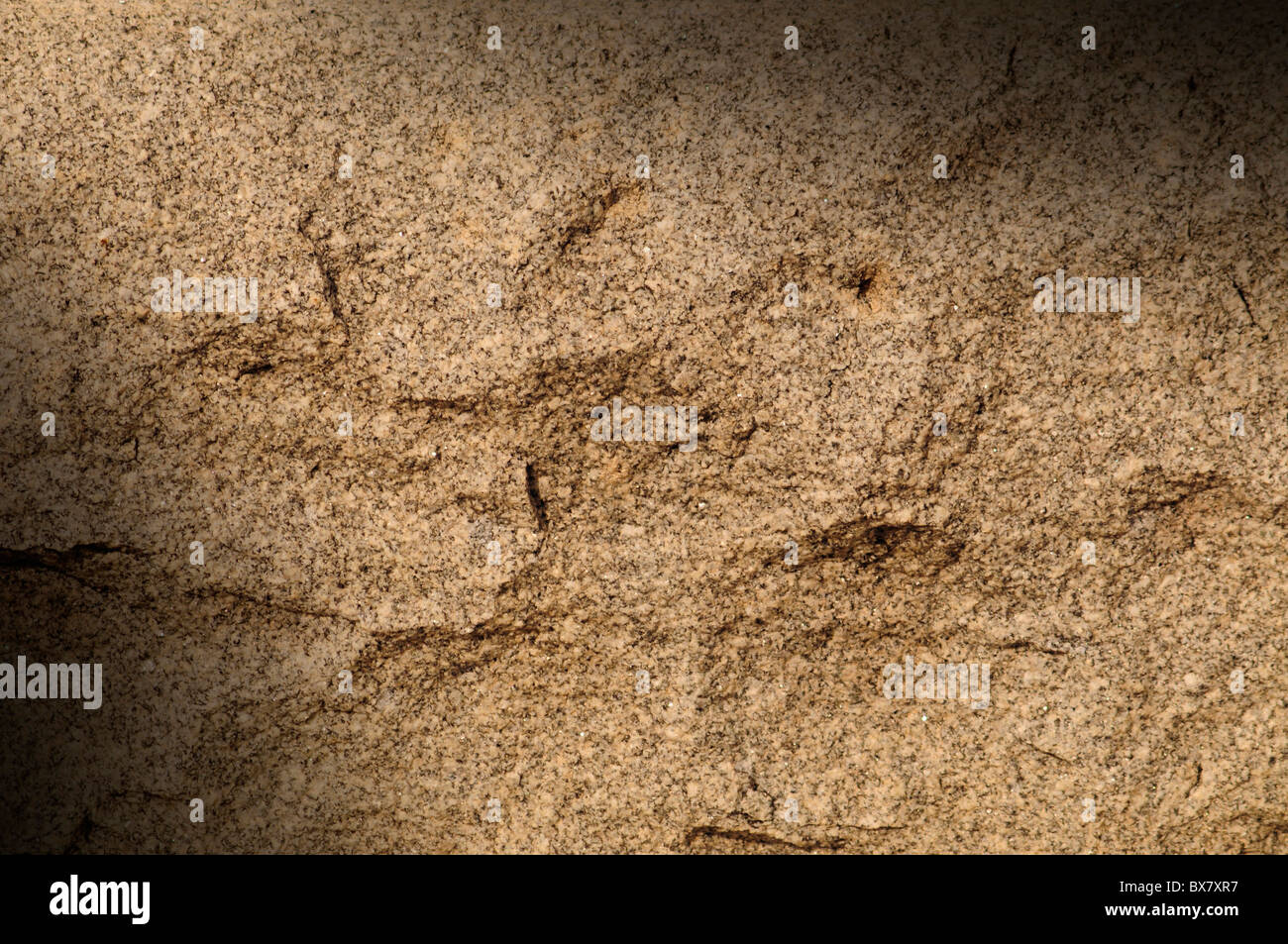 Surface de roche de granite allumé en diagonale Banque D'Images