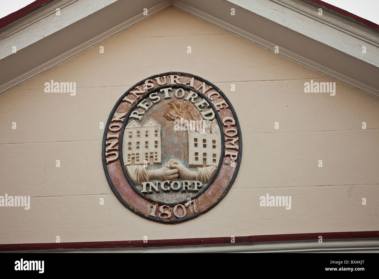 Une marque de feu, une plaque indiquant l'assurance incendie sur un bâtiment à Charleston, SC. Charleston est le premier de l'assurance-incendie. Banque D'Images