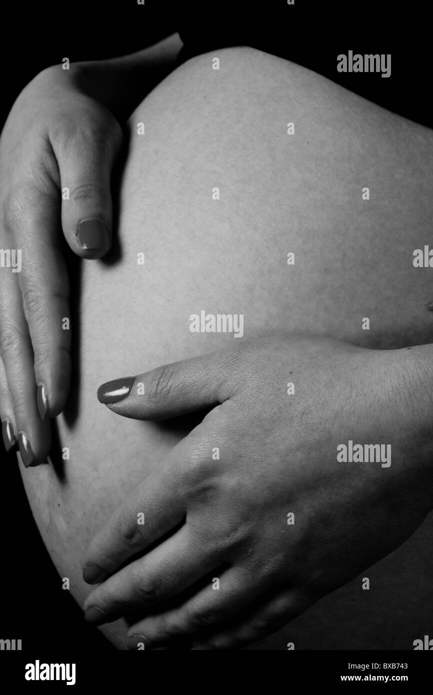 Le ventre d'une femme enceinte à 38 semaines Banque D'Images