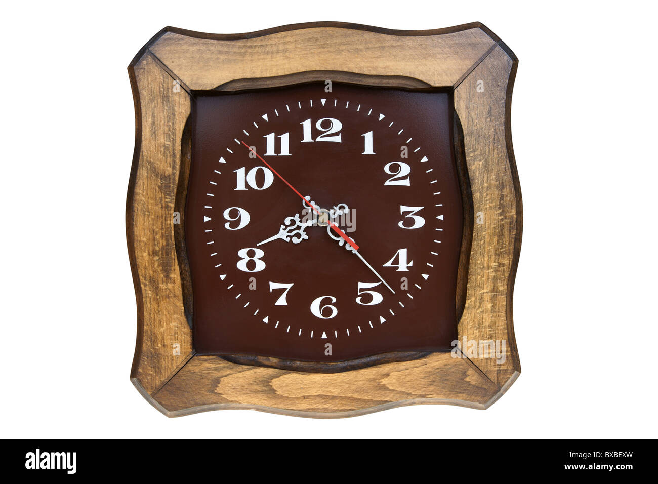 Old brown watch dans le cadre en bois isolé sur fond blanc Banque D'Images