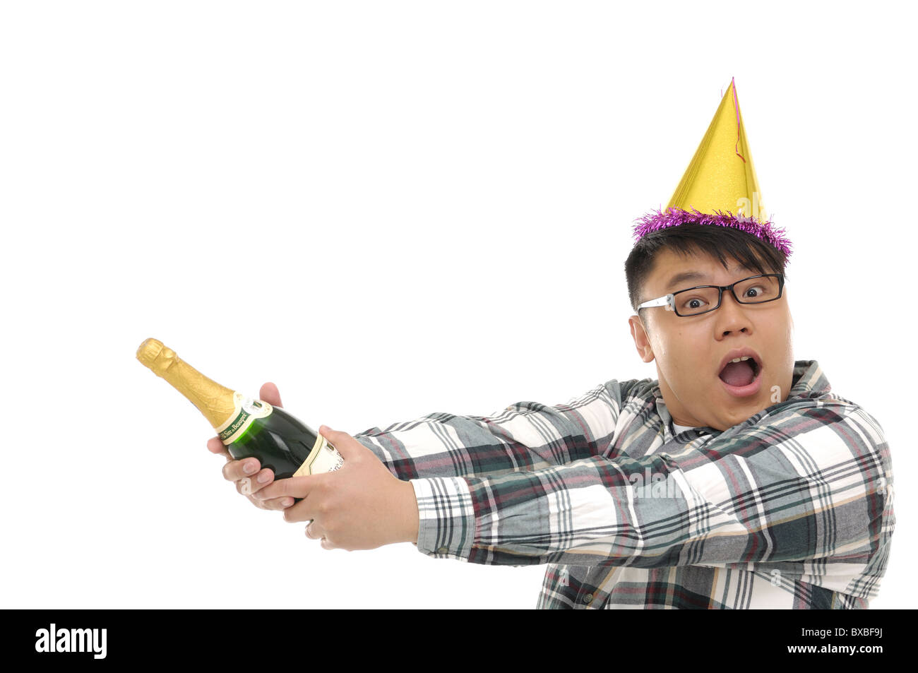 L'homme de l'ouverture d'une bouteille de champagne et à la hâte Banque D'Images L'homme de l'ouverture d'une bouteille de champagne et à la hâte Banque D'Images