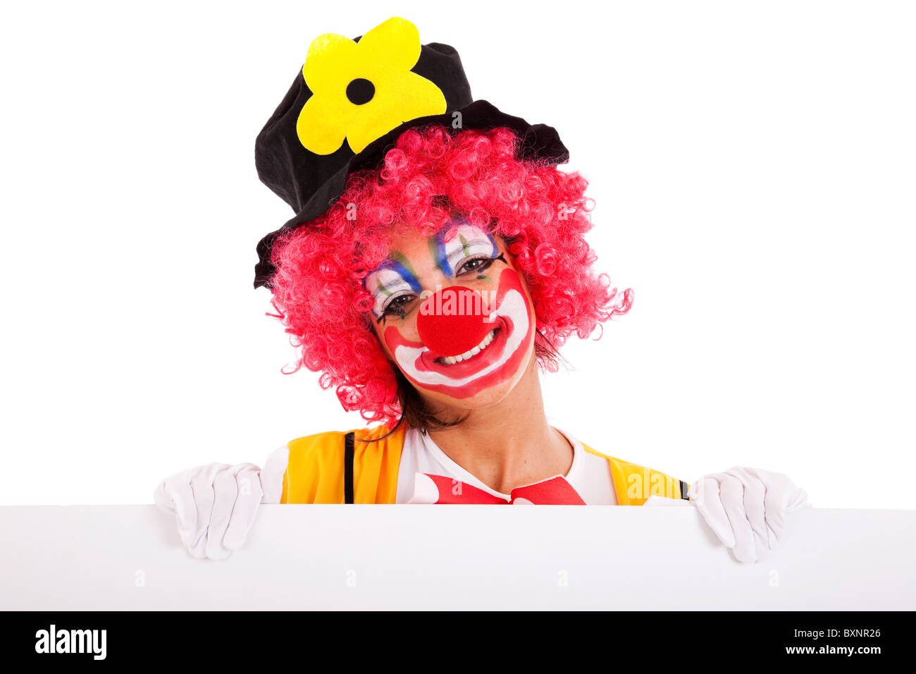 Funny clown debout sur un fond blanc Banque D'Images
