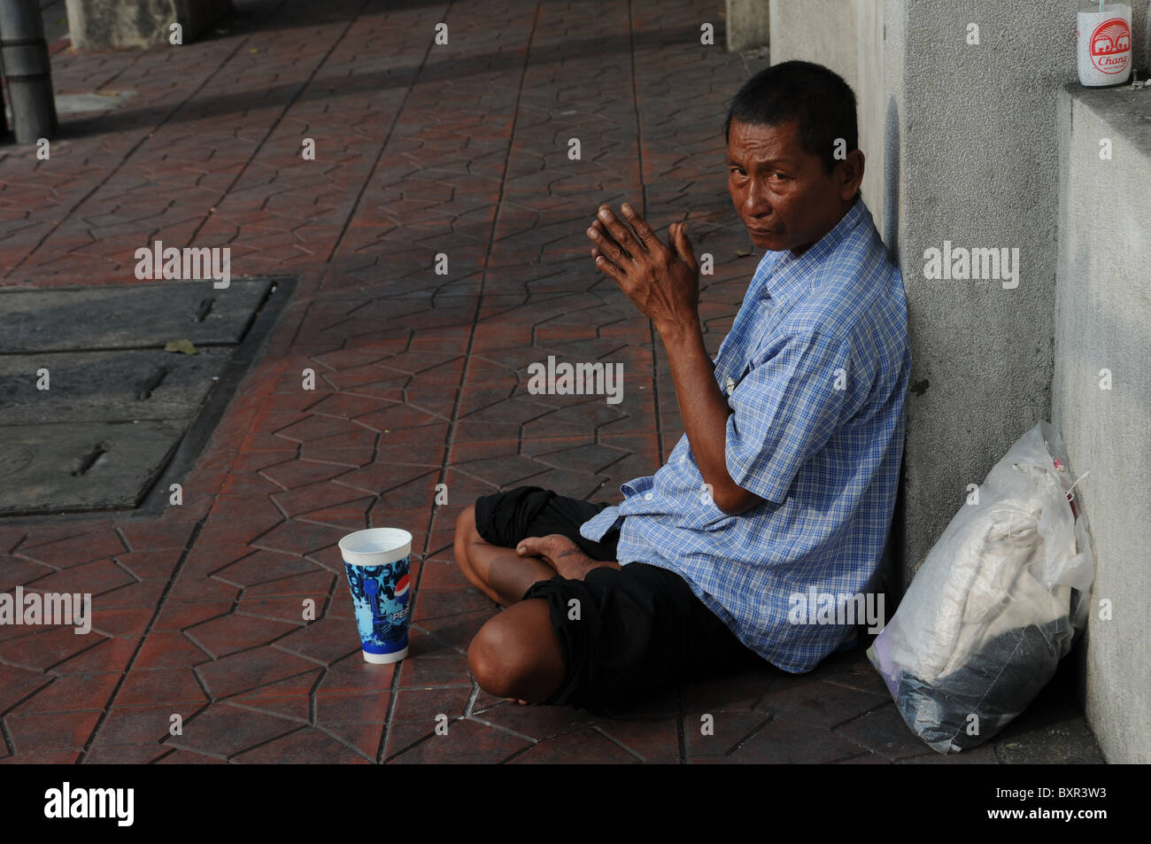 Pauvre mendiant à Bangkok Banque D'Images