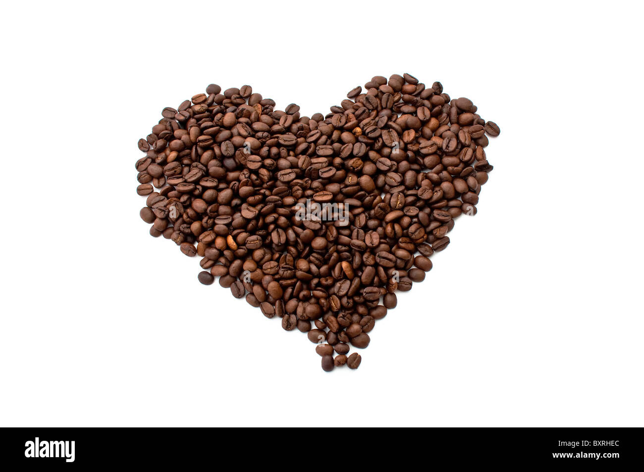 Beau brun, les grains de café, en forme de coeur Banque D'Images