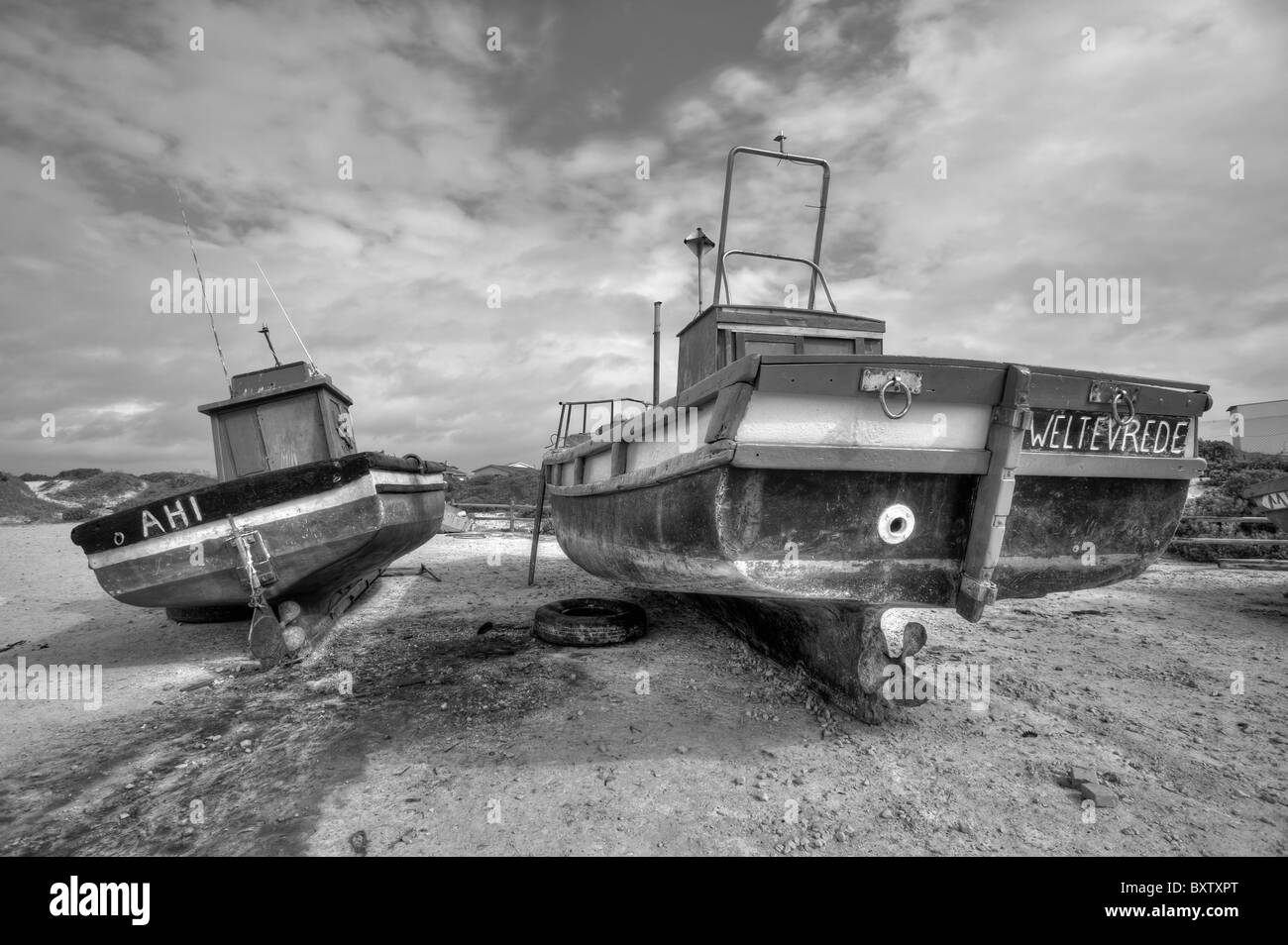 Bateaux de pêche sur le quai pour les réparations et l'entretien dans Struisbaai près du cap Agulhas Le point le plus sud de l'Afrique. Banque D'Images