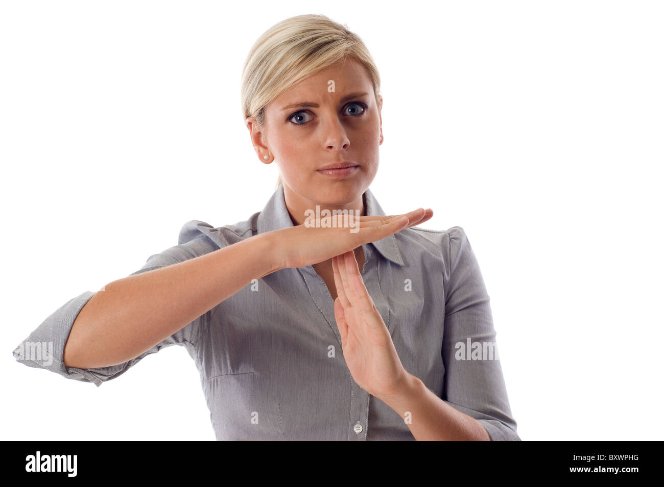 Business Woman showing time out signe avec mains isolé sur fond blanc Banque D'Images