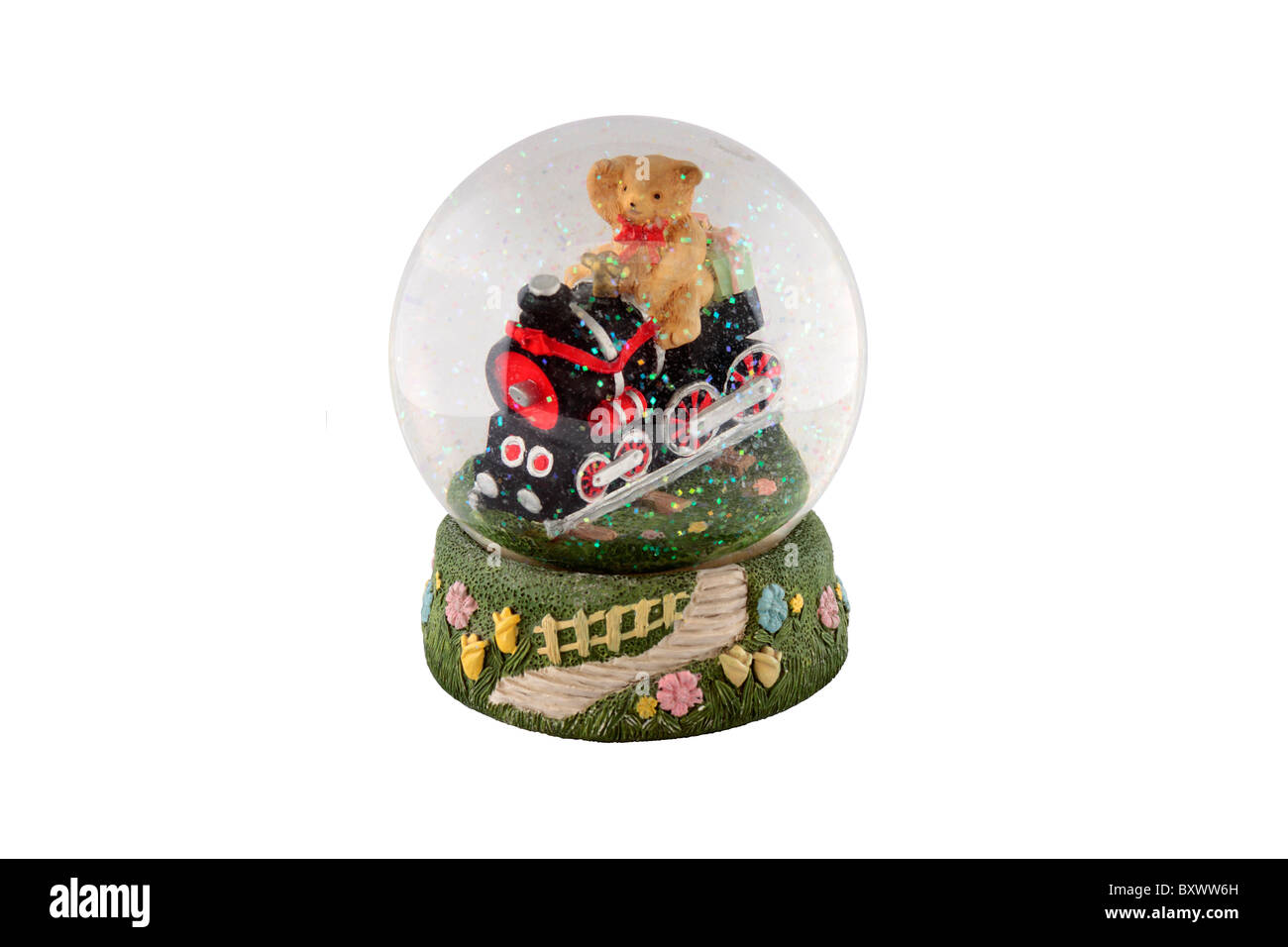Snow Globe avec un ours en peluche dans un train Banque D'Images
