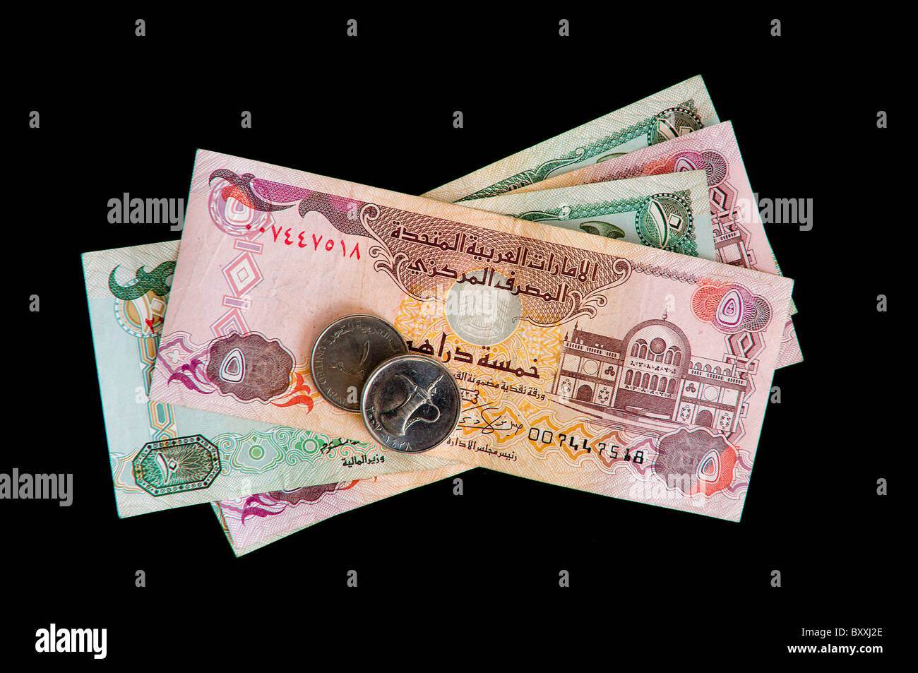 Certains billets et pièces des E.A.U. Banque D'Images