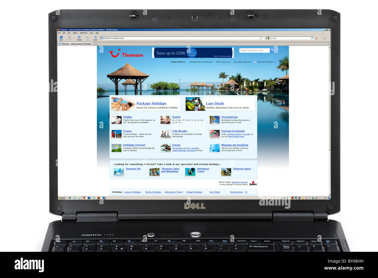 La navigation sur le site Thomson Holidays sur un ordinateur portable, UK Banque D'Images