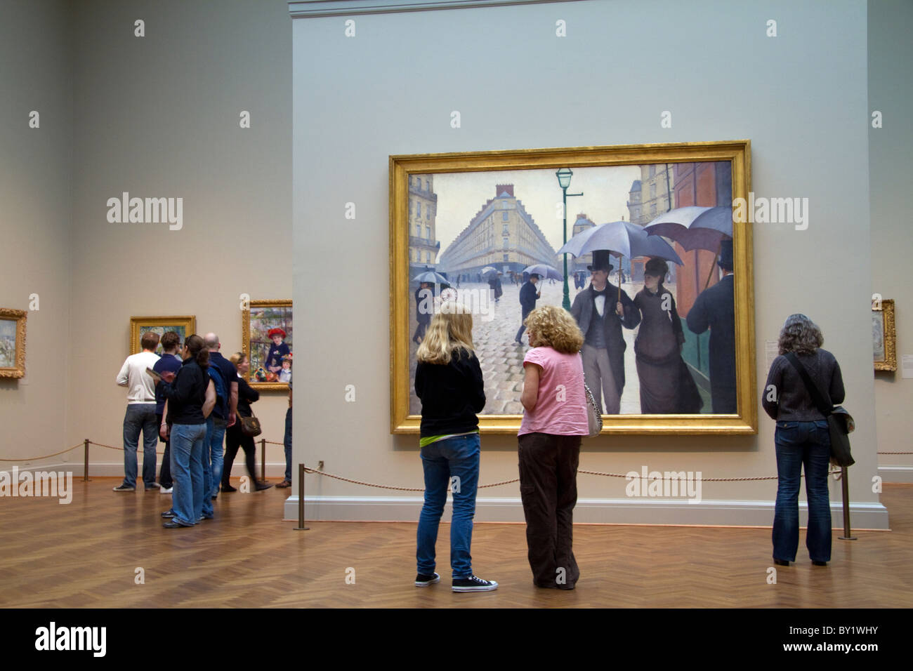 Rue de Paris ; Jour de pluie peinture de Gustave Caillebotte affichée à l'Art Institute de Chicago, Illinois, USA. Banque D'Images