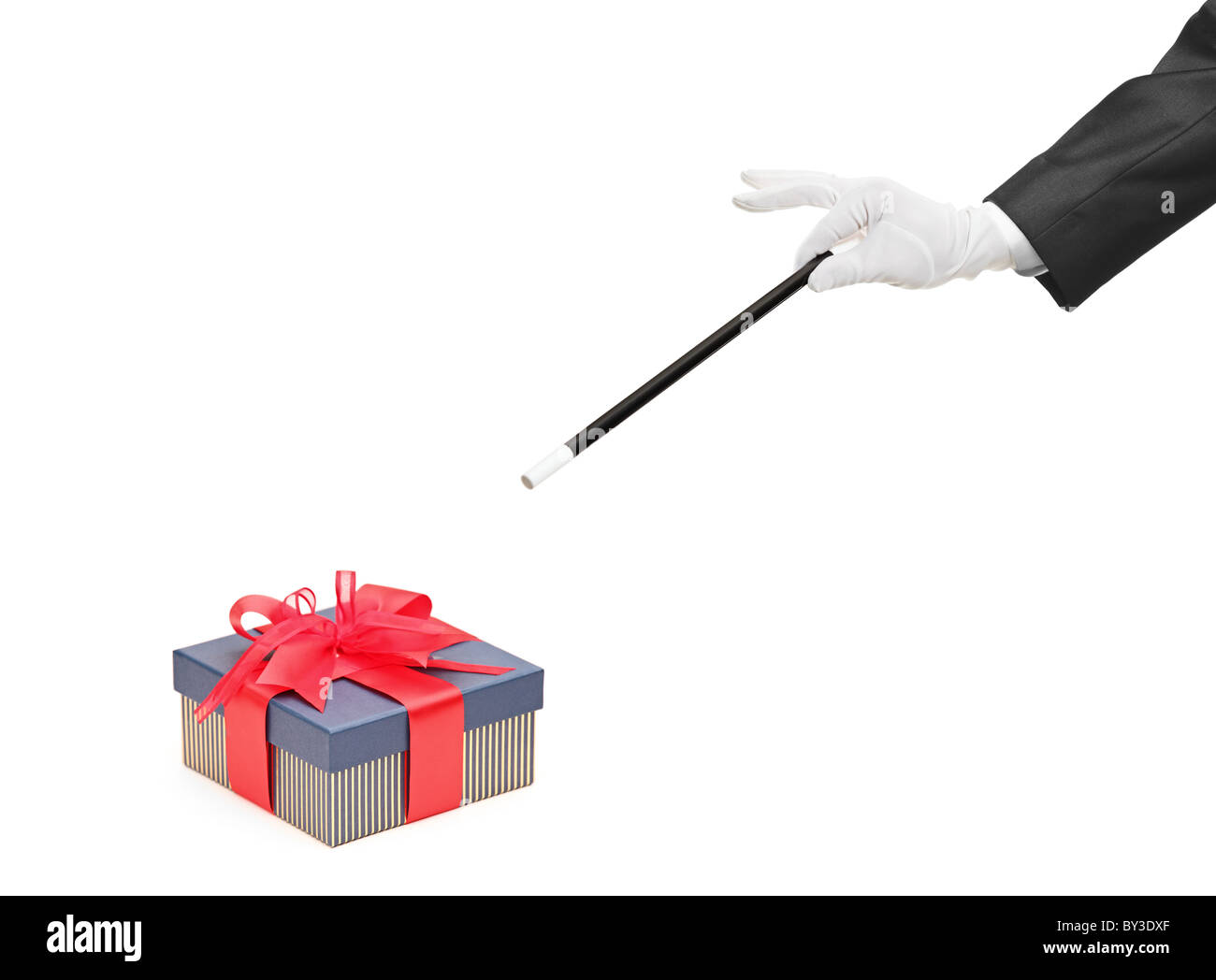 Un magicien avec une baguette magique sur les cadeaux emballés Banque D'Images