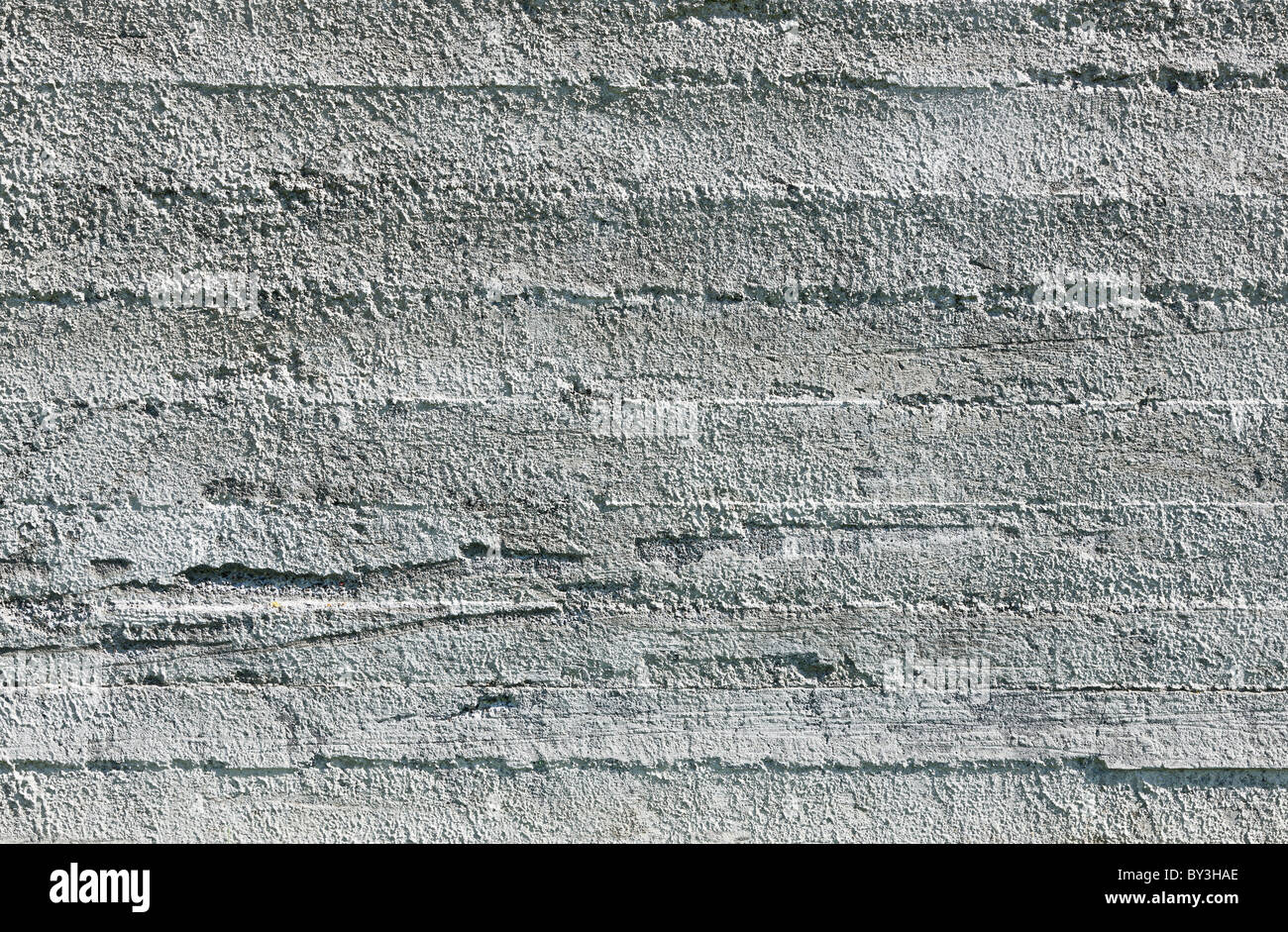 La texture du mur de béton vide parfaitement éclairée - Banque D'Images