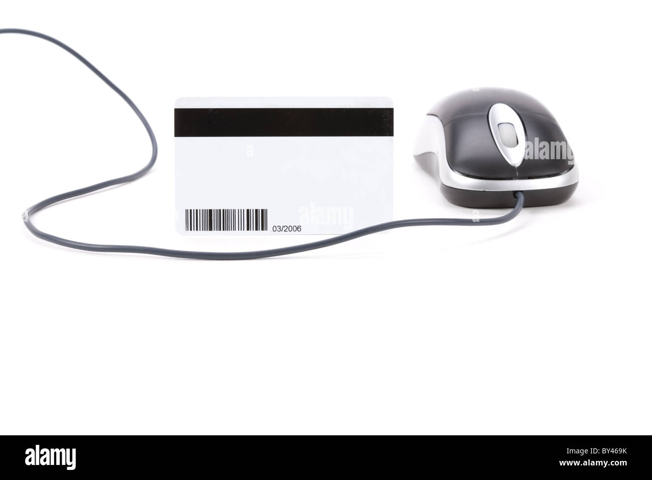 Carte de données numériques en plastique et souris d'ordinateur close up Banque D'Images