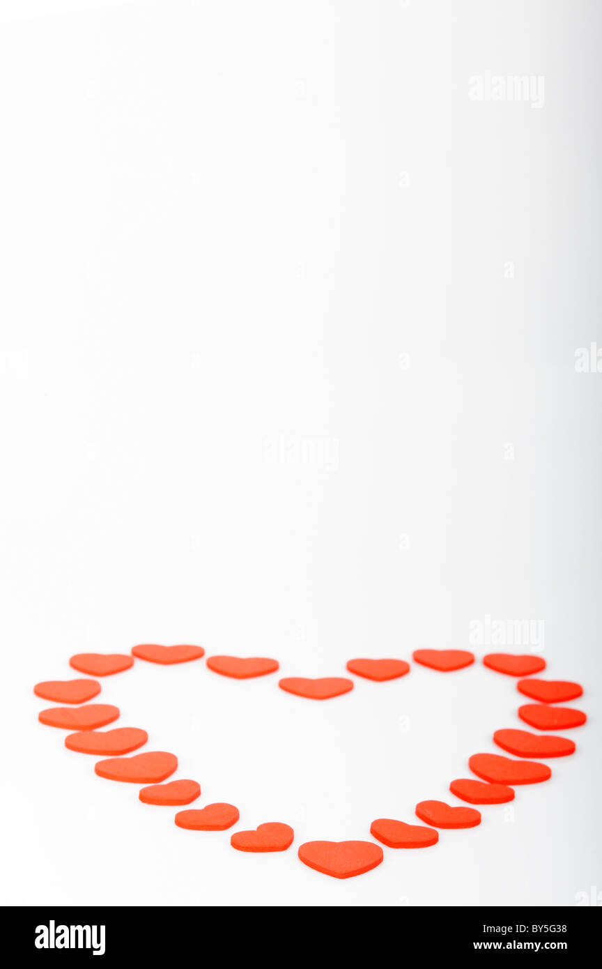 Stock photo amour coeur rouge s'affiche sur un fond blanc. Banque D'Images