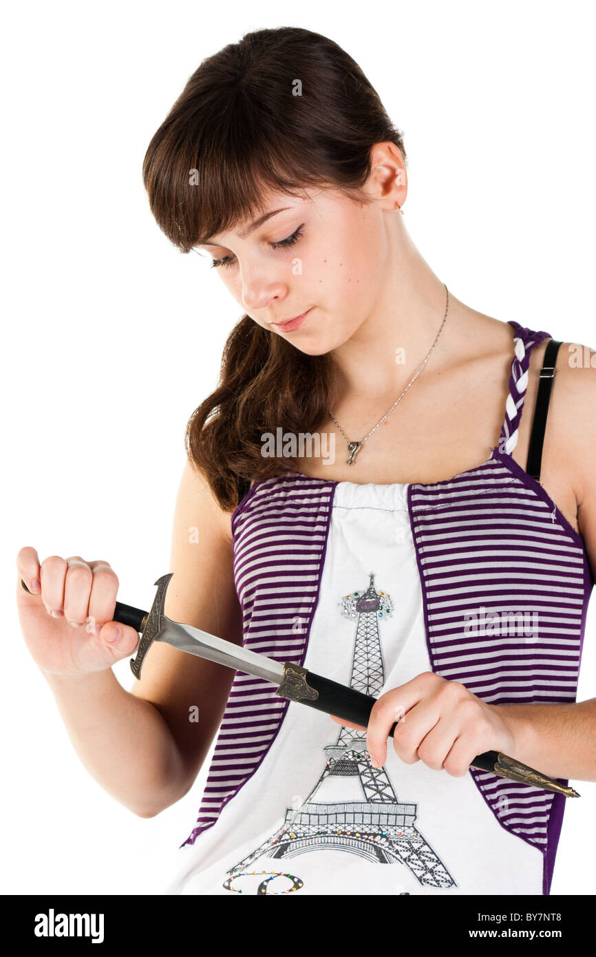 Belle fille avec un couteau isolé pensif Banque D'Images