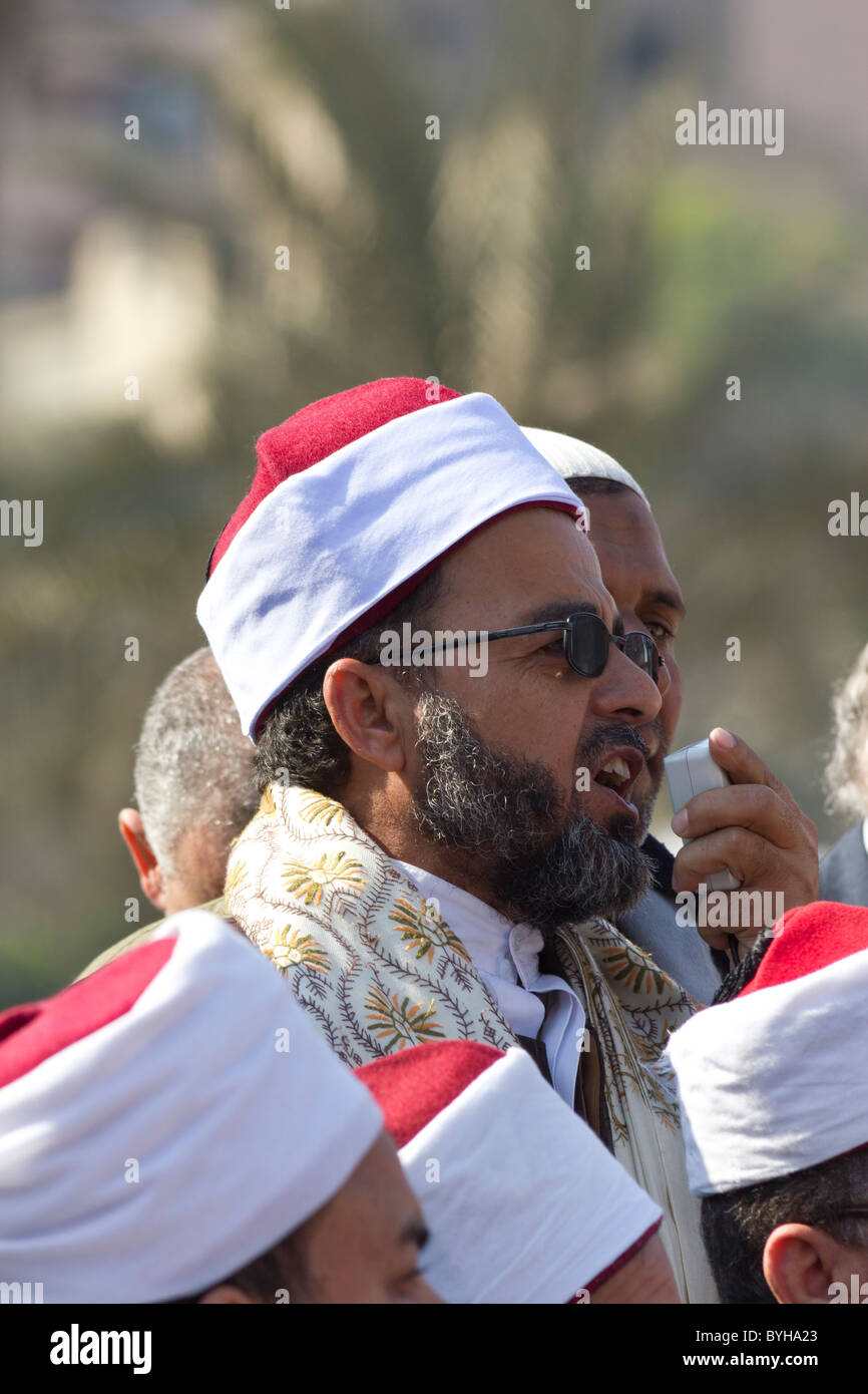 Discours faisant figure religieuse dans les manifestations anti-Moubarak sur la place Tahrir, Le Caire, Egypte Banque D'Images