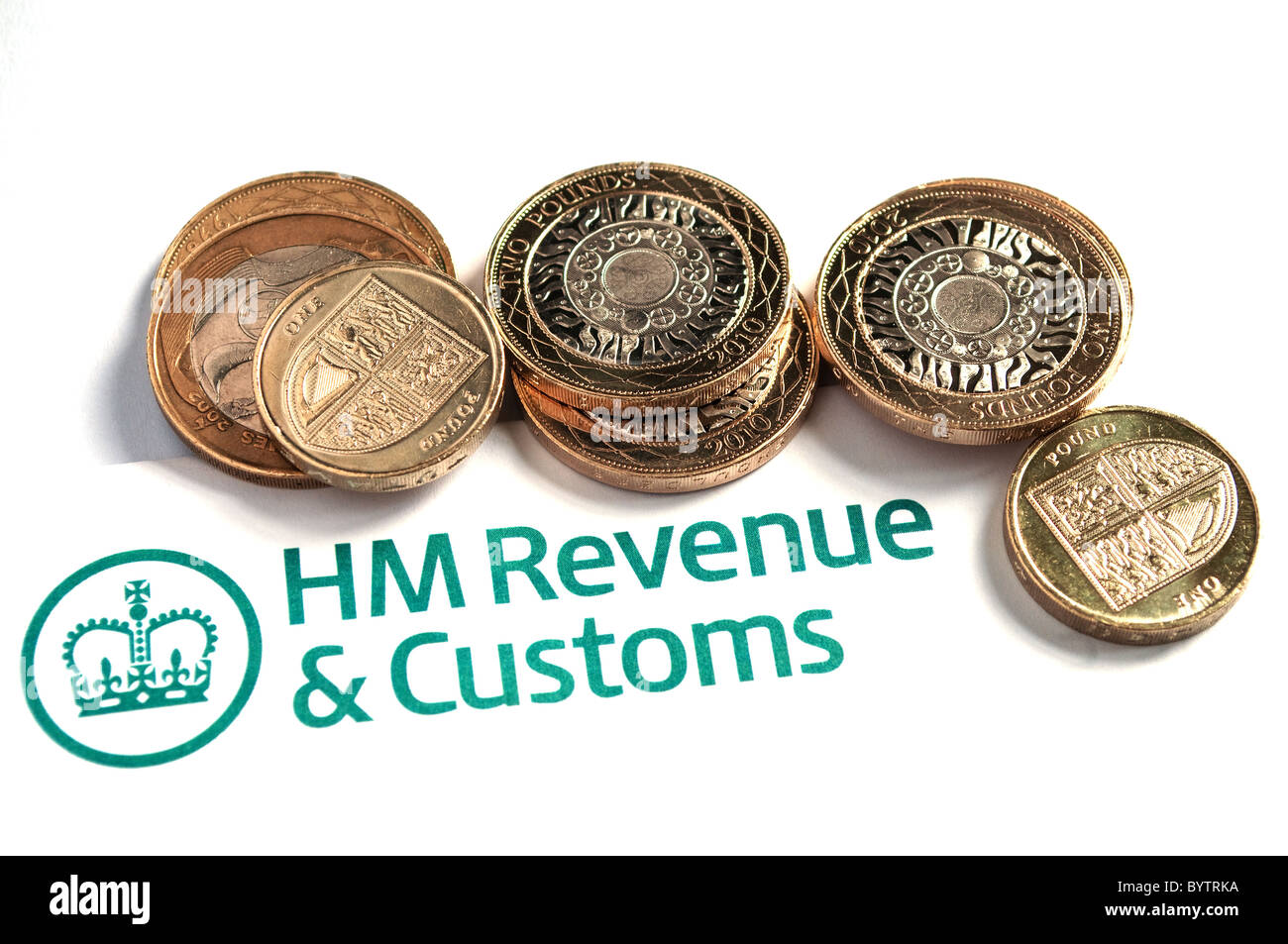 HM Revenue and Customs un formulaire d'impôt et des pièces Banque D'Images