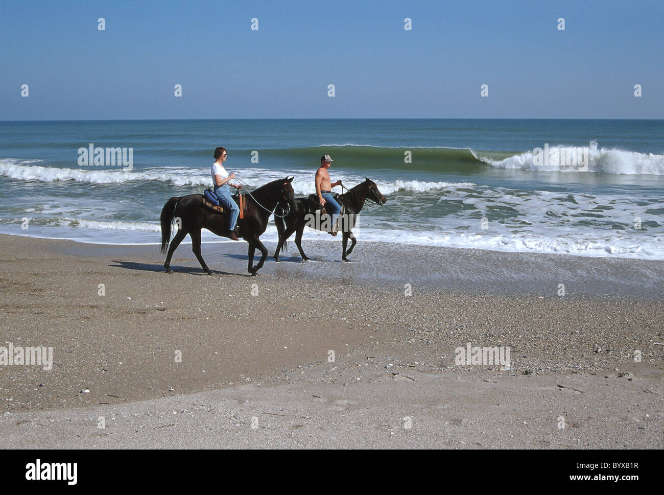 L'équitation sur la plage à Amelia Island en Floride Banque D'Images