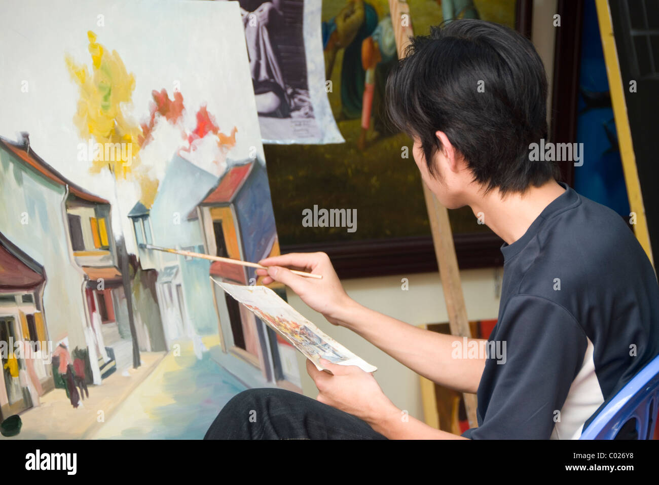 La copie de l'artiste une peinture à Hanoi, Vietnam. Banque D'Images