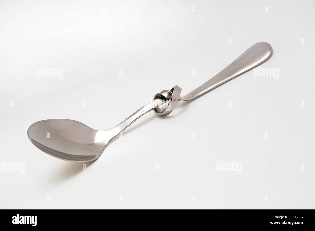 La cuillère avec Maggi noeud. Banque D'Images