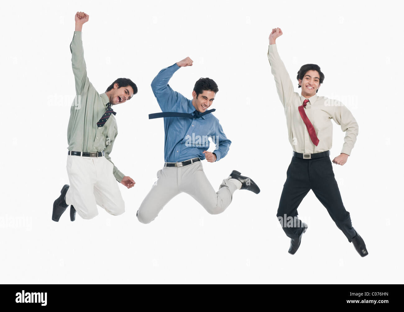 Trois hommes d'jumping Banque D'Images