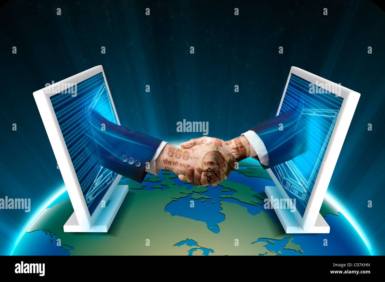 Deux ordinateurs shaking hands Banque D'Images