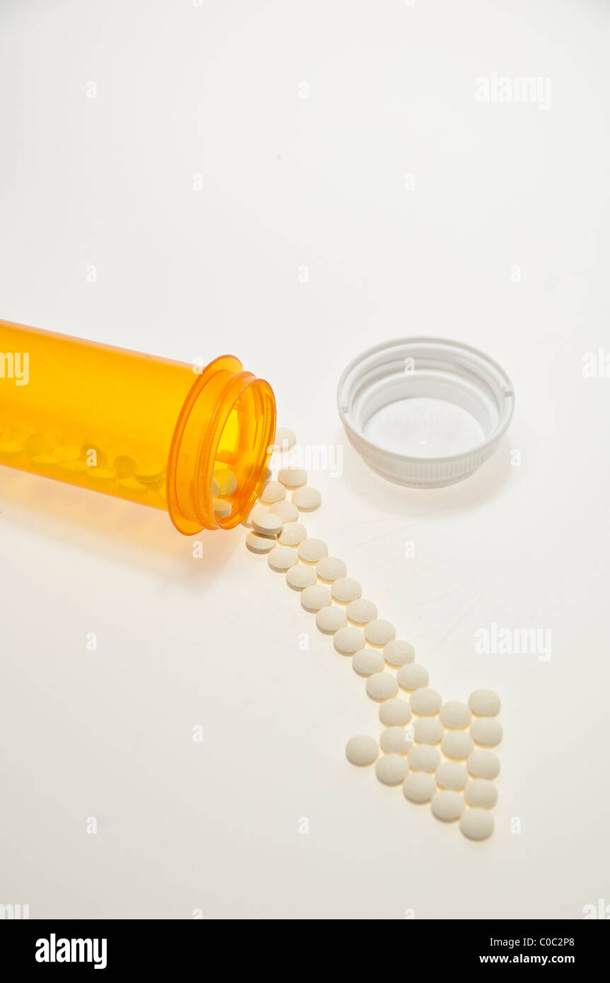 Pointeur flèche faite de pilules Banque D'Images