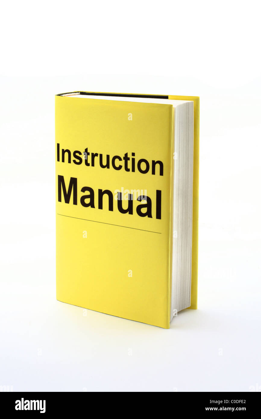 Livre jaune avec des mots le manuel d'Instruction sur le couvercle. Banque D'Images