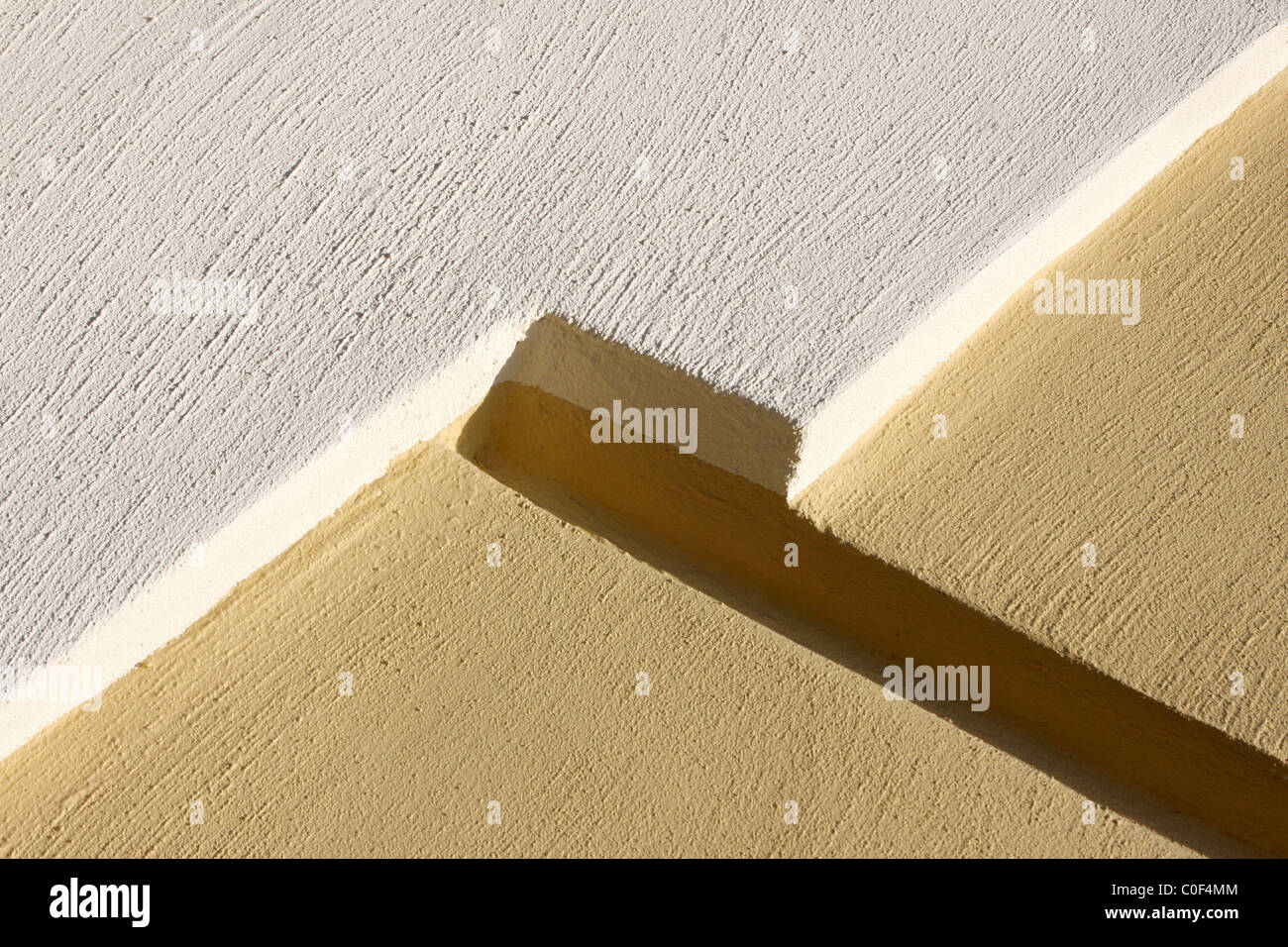 La texture du béton blanc et jaune Banque D'Images