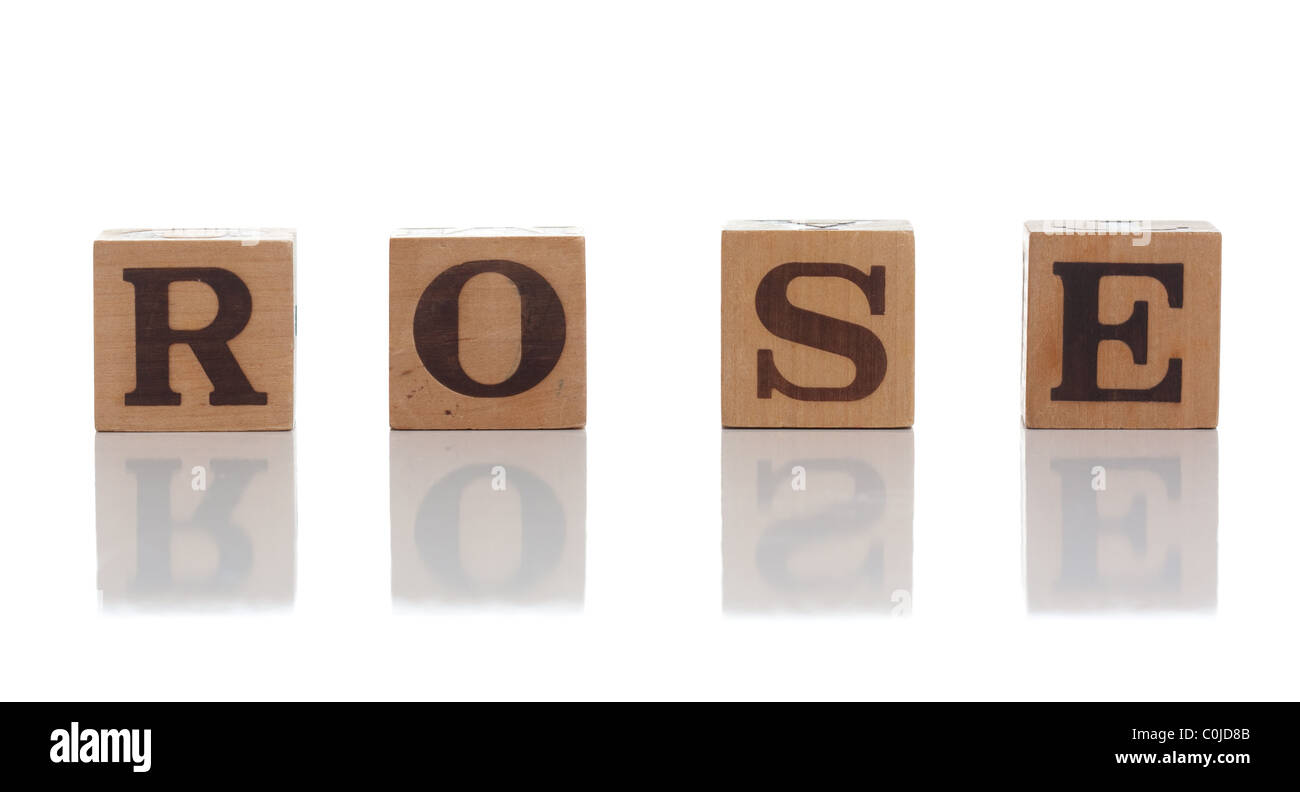 Mot en bois isolé sur blanc close up Banque D'Images