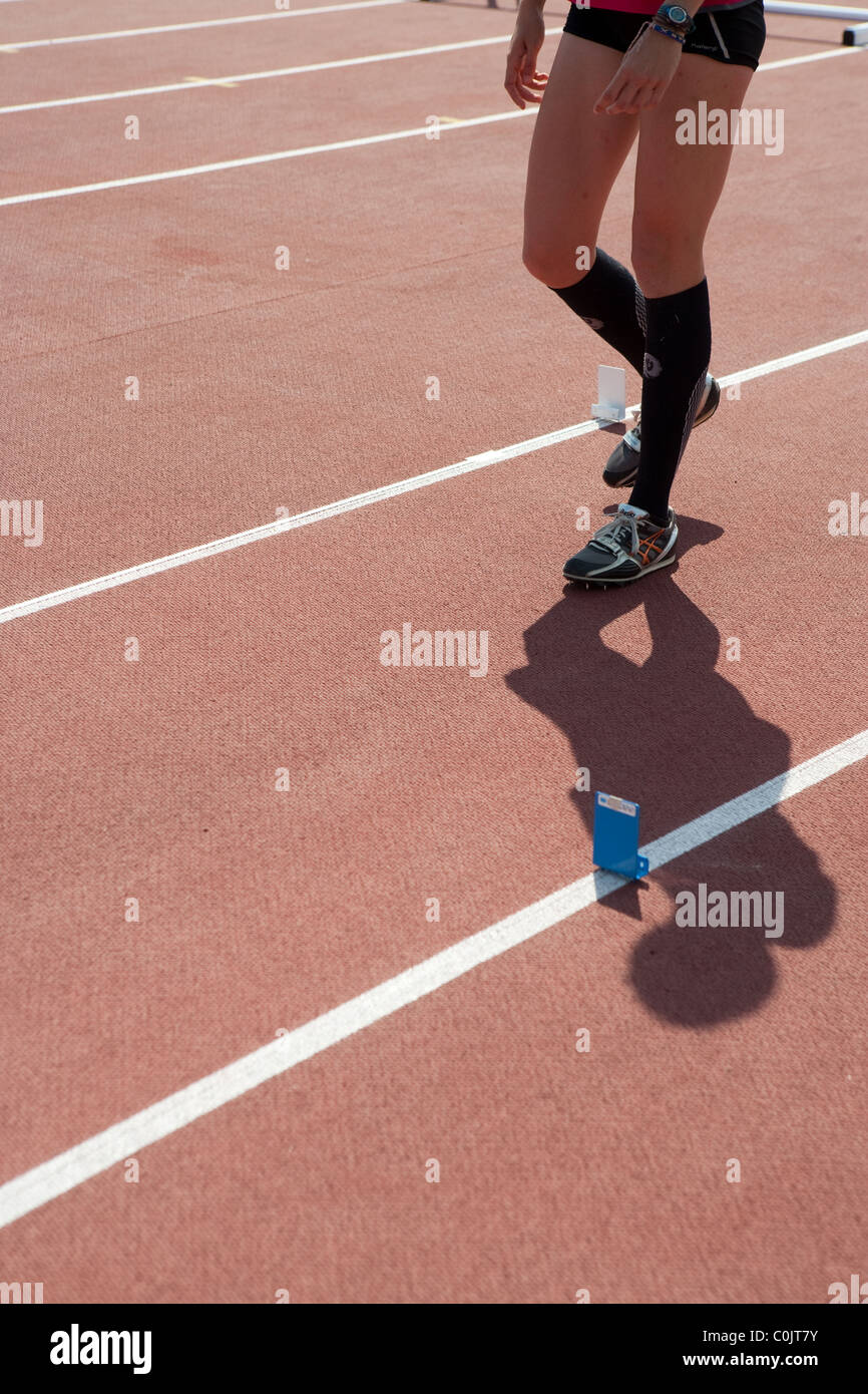 Championnats de sport athlétisme d'Espagne Palma de Mallorca Espagne stade les jambes de l'athlète sur la voie Banque D'Images