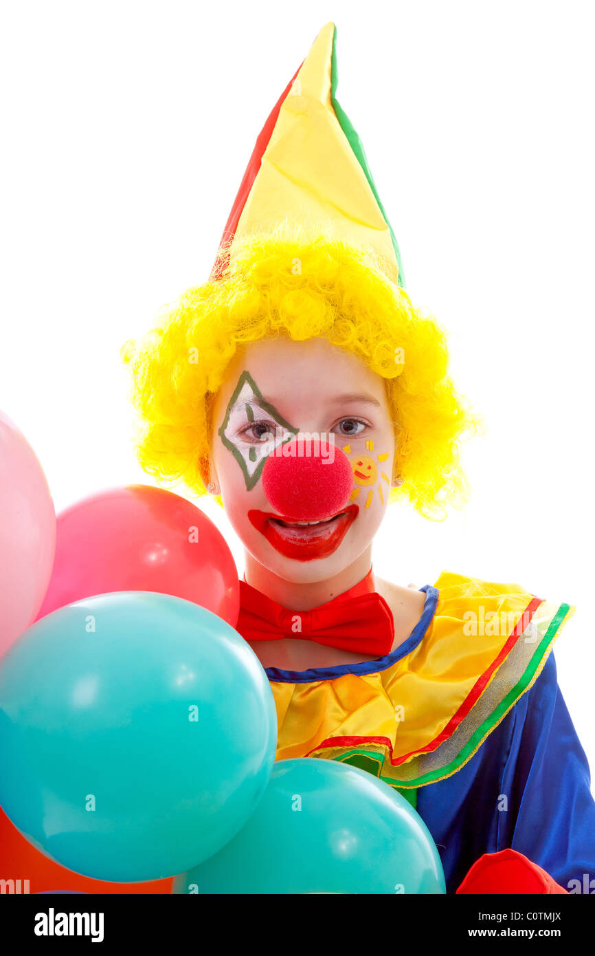 Enfant habillé en clown rigolo colorés avec des ballons sur fond blanc Banque D'Images