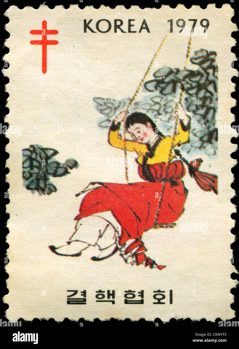 Timbre ancien de la Corée avec photo d'une jeune fille sur une balançoire Banque D'Images