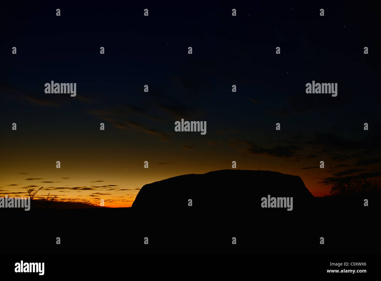 Lumières et couleurs d'Ayers Rock en Australie Banque D'Images
