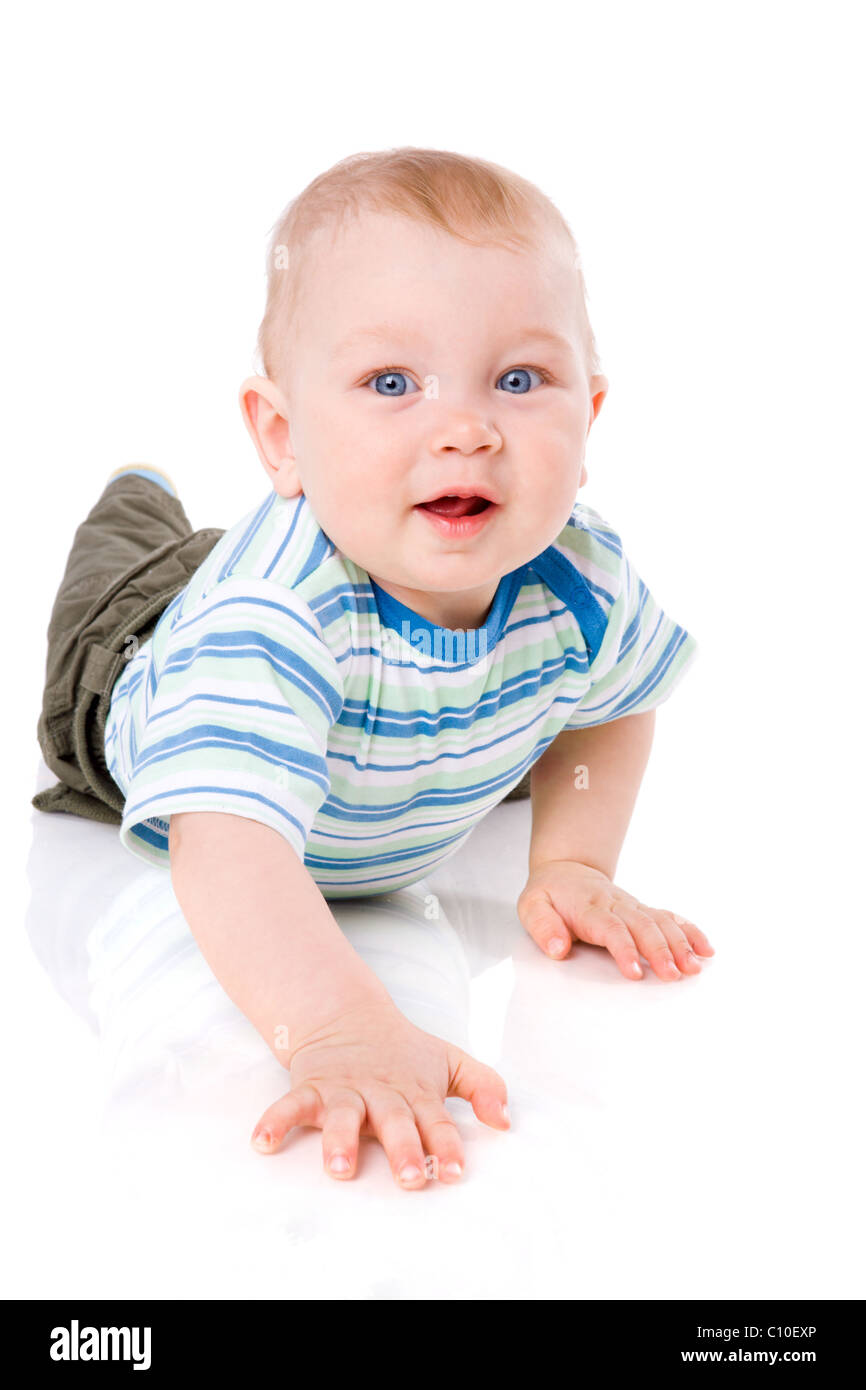 Un an boy lying on floor isolated on white Banque D'Images