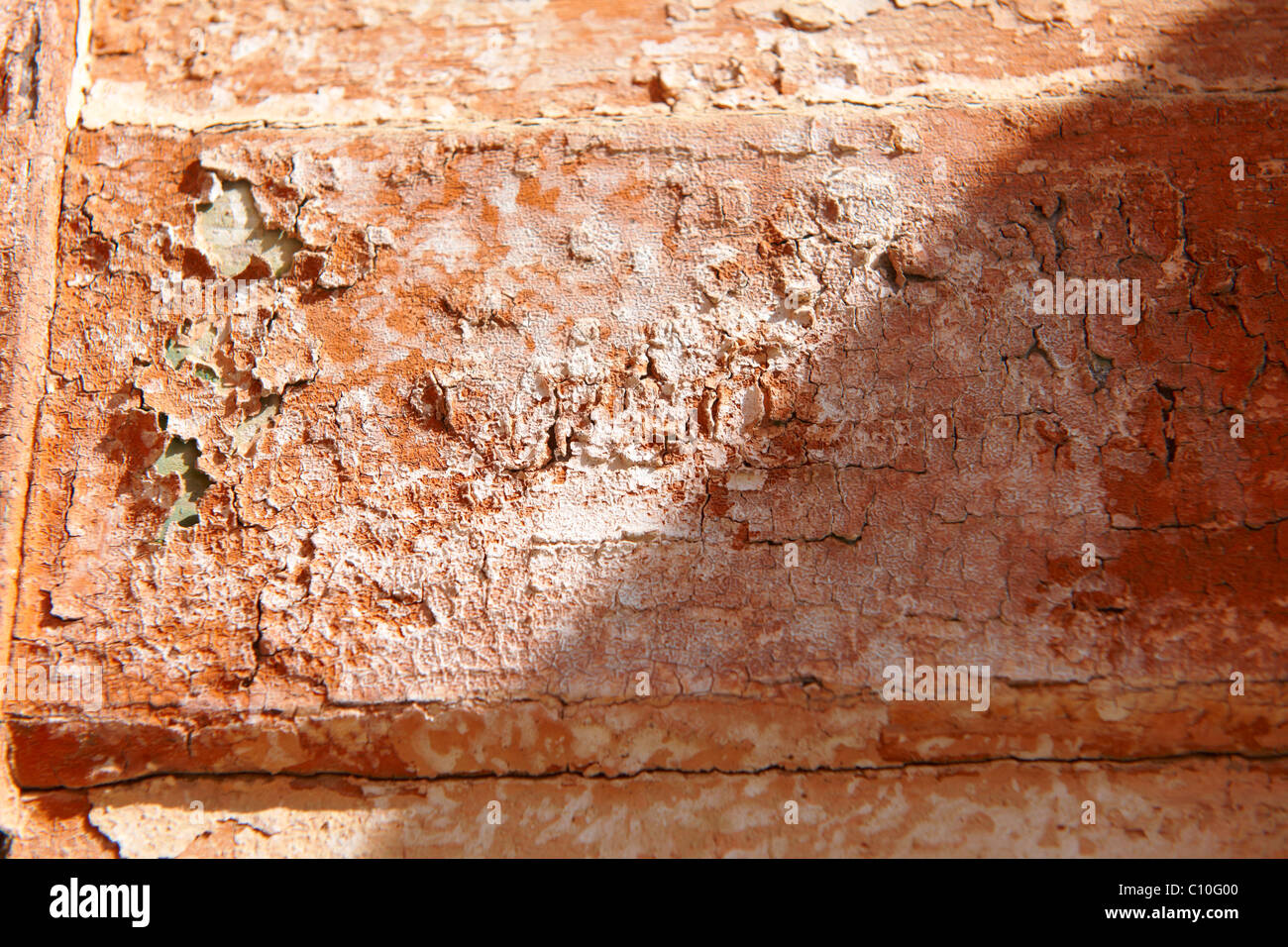 L'écaillage de la peinture orange fond close up Banque D'Images