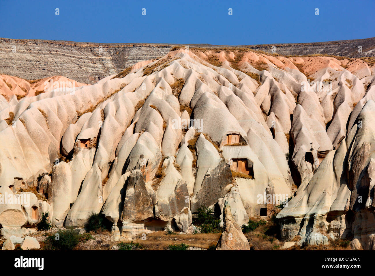 Photo de la vallée de 'word' ('Kiliclar Vadisi") qui ressemble à d'énormes la fonte de la glace à la vanille, Nevsehir, Cappadoce, Turquie Banque D'Images