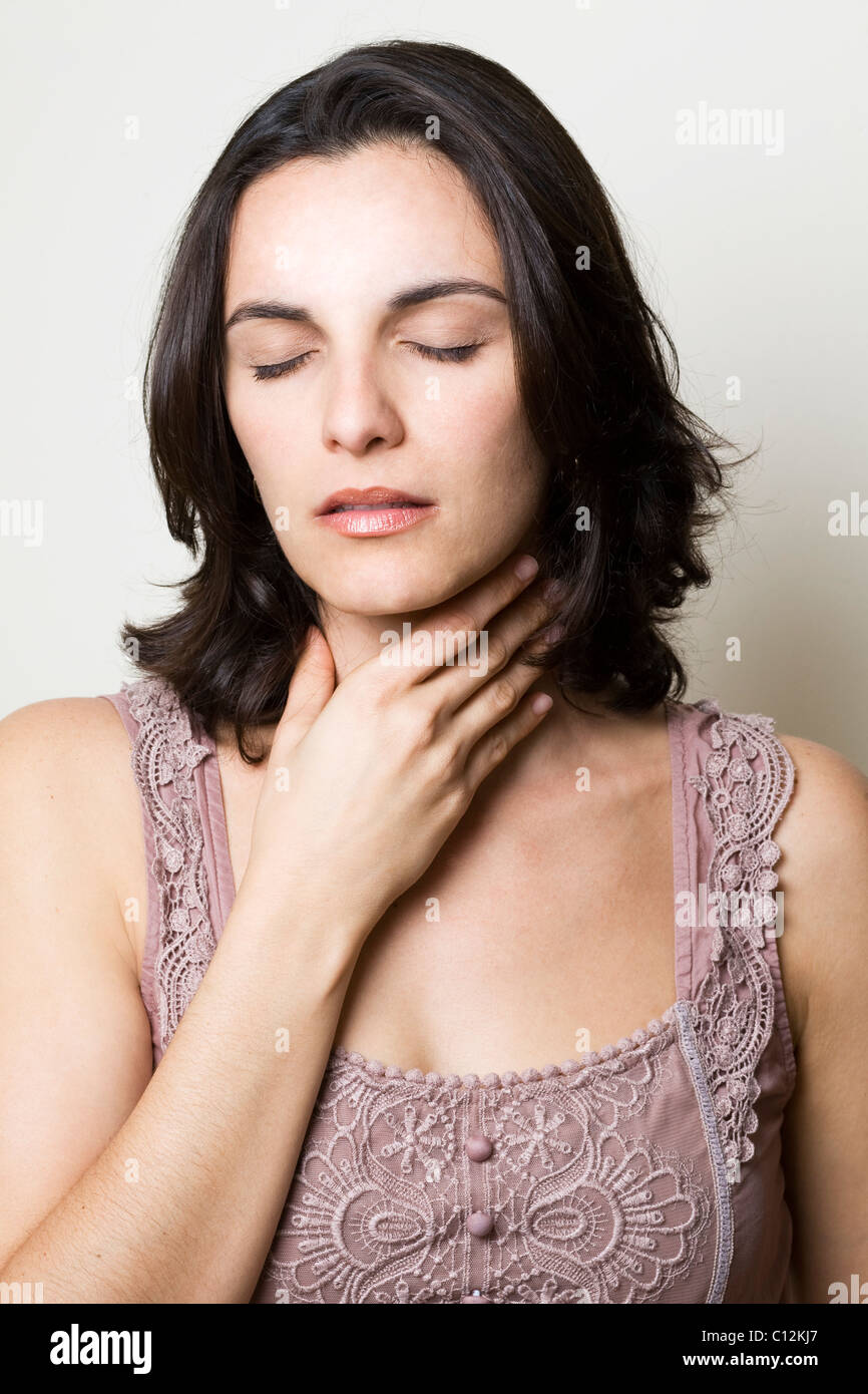 Mal de gorge femme Banque D'Images