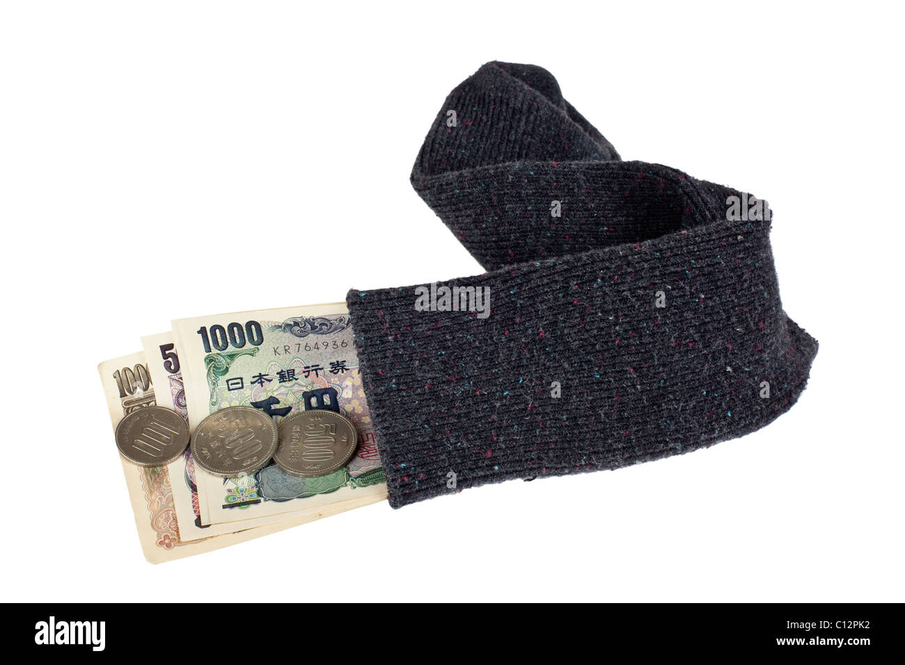 Monnaie japonaise dans une chaussette isolé sur fond blanc Banque D'Images