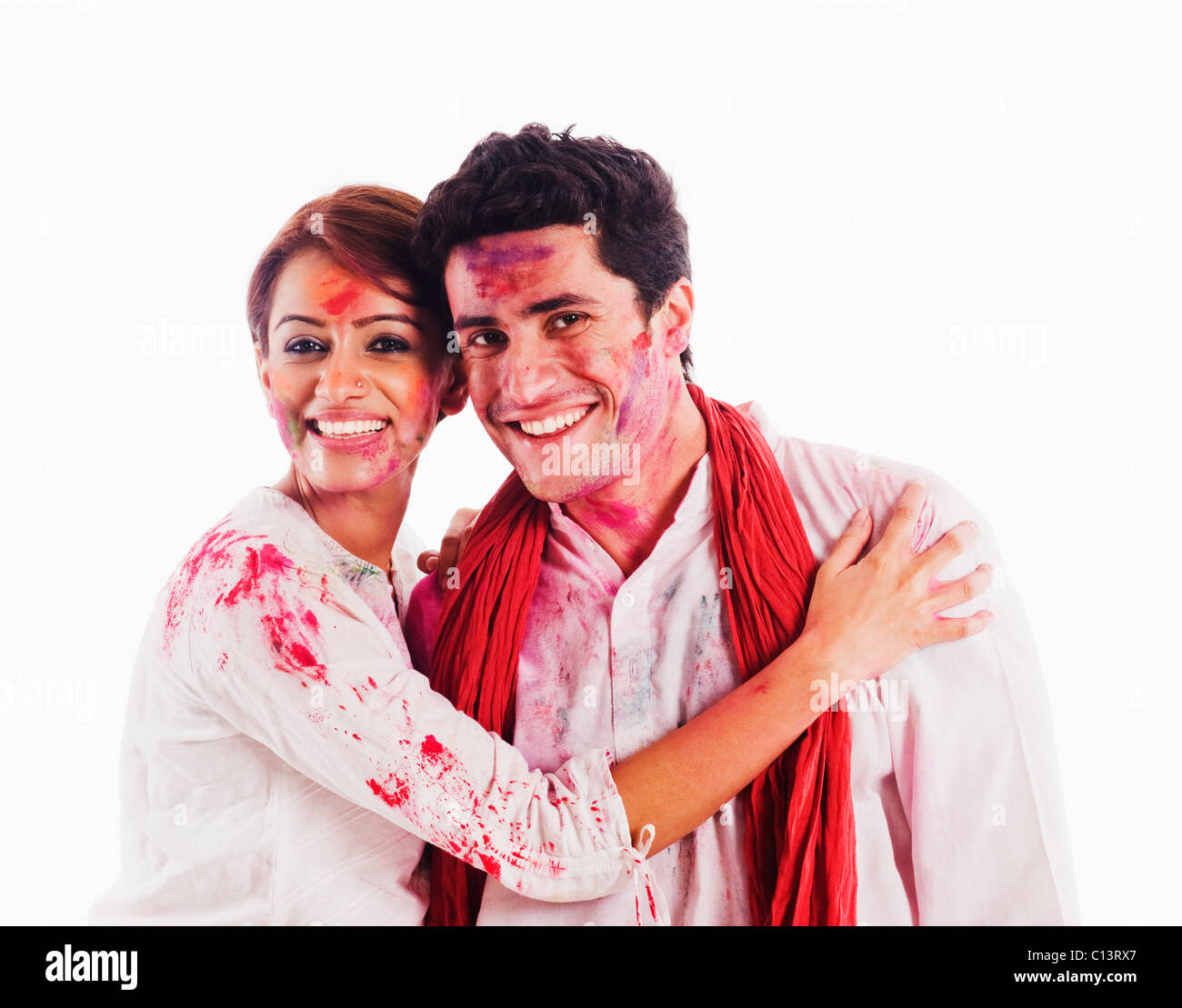 Portrait d'un couple célébrant Holi Banque D'Images