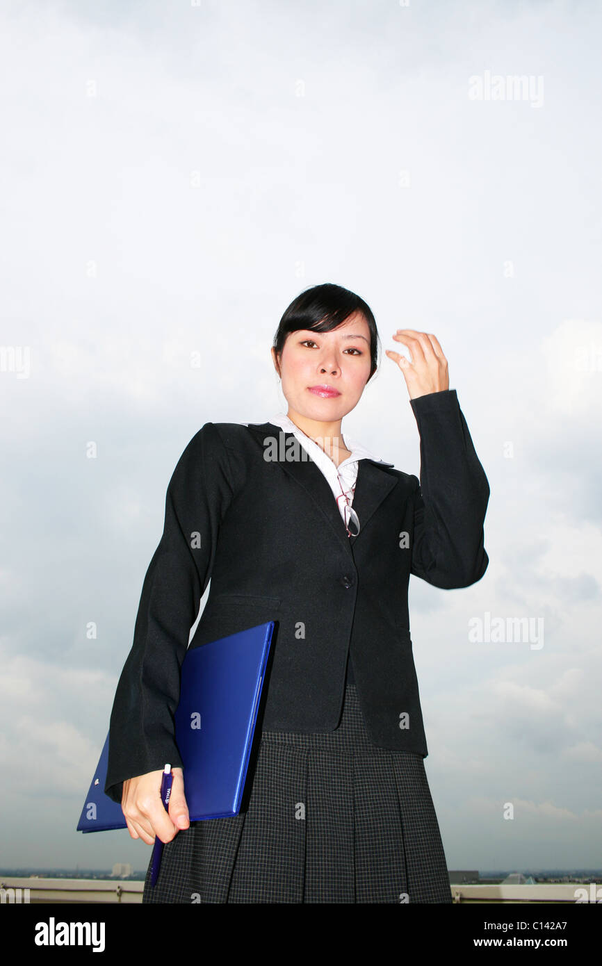 Asian business woman à l'extérieur. Banque D'Images