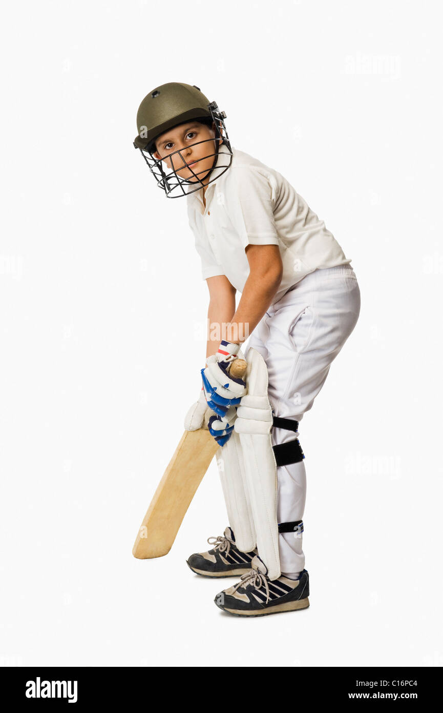 Boy playing cricket Banque D'Images