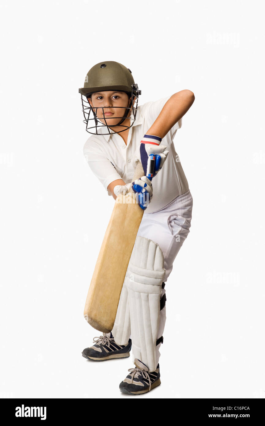 Boy playing cricket Banque D'Images