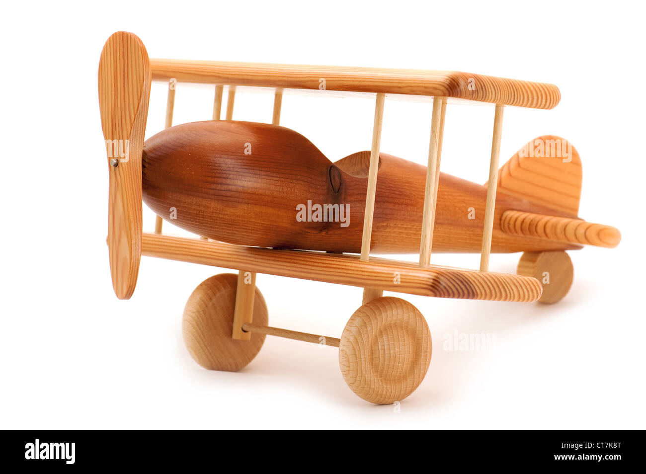 Objet sur blanc - avion jouet en bois Banque D'Images